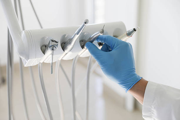 Professional Invisalign Clear Aligners technician working in Manchester, MI